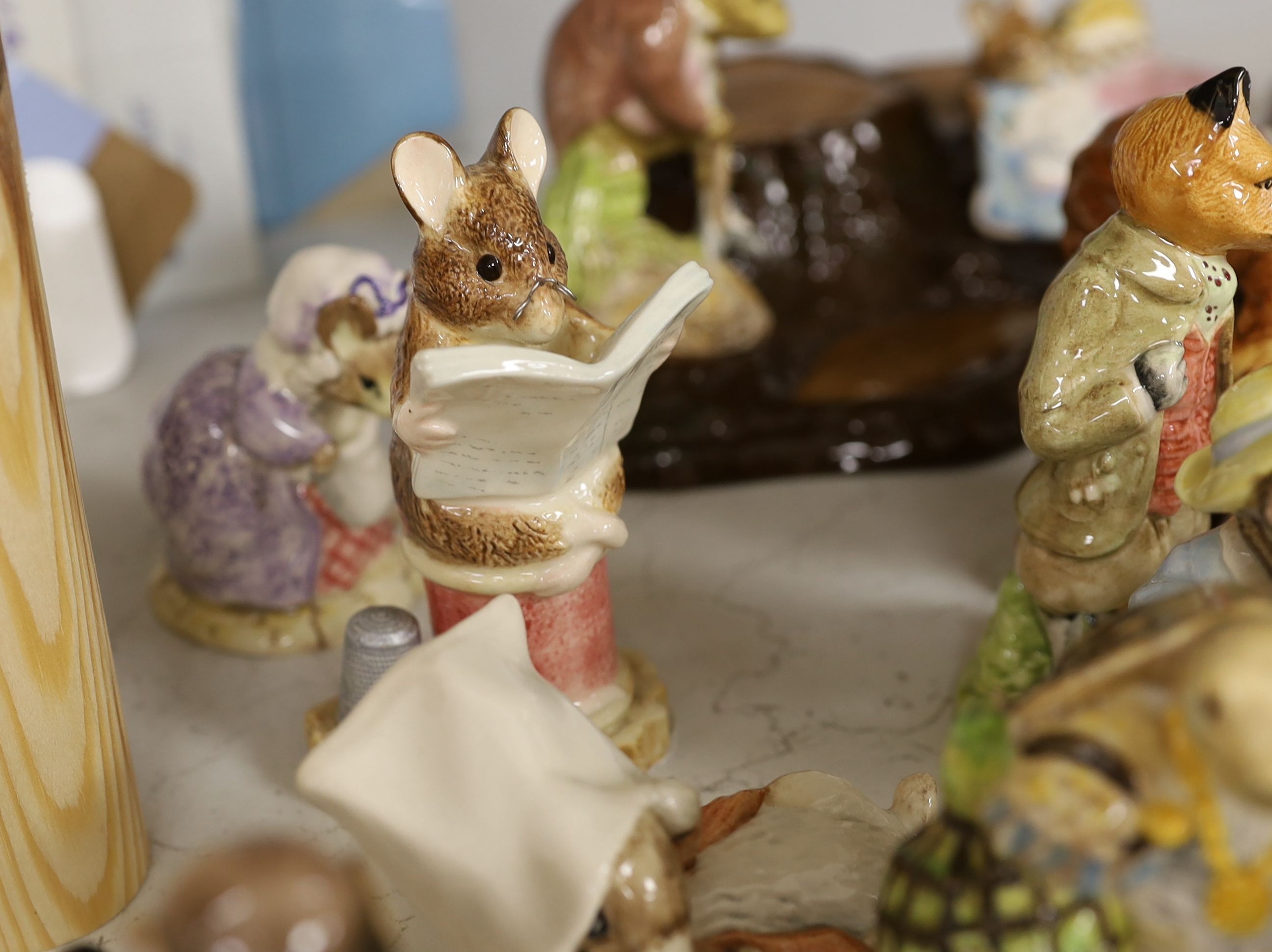 A collection Beswick, Royal Albert and Border Fine Arts Beatrix Potter figures